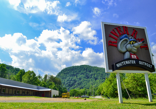 Smoky Mountain River Rat Whitewater sign and building